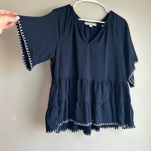 Loft top, embroidered edges